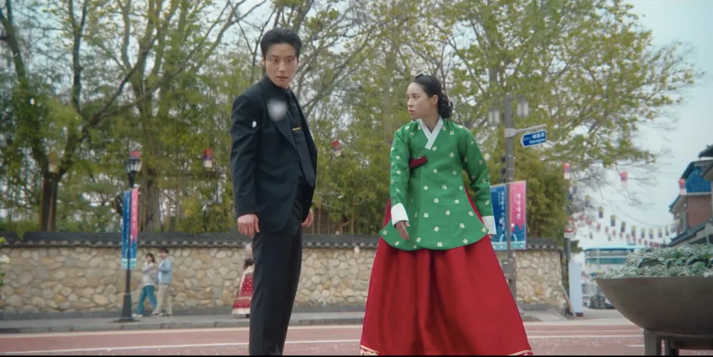 Se-gye and Seo-ri's comic flower fight on a blossom-lined street near Gwanghalluwon