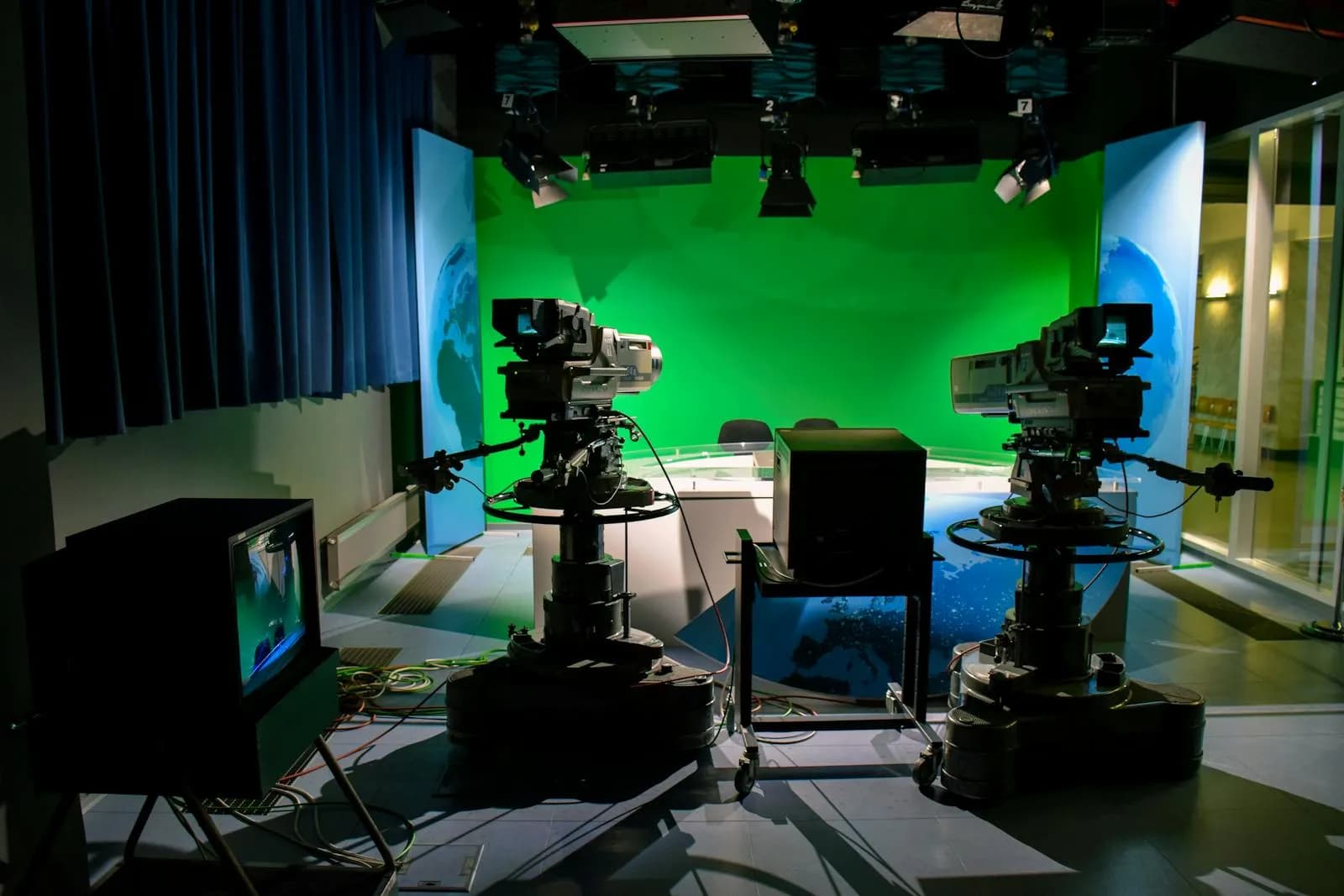 TV studio stage with professional lighting and camera equipment set up for a live music broadcast