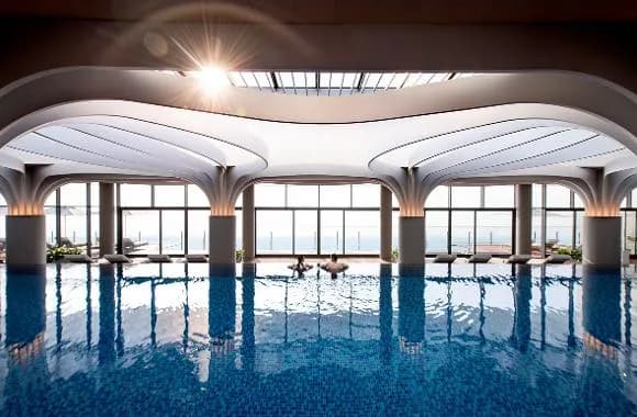 Ananti Water House indoor pool with arched ceiling and skylight