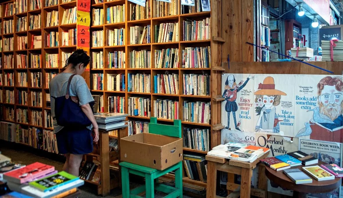 Interior of a Bosu-dong used bookstore stacked floor-to-ceiling with secondhand books