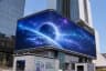 COEX K-Pop Square 3D LED screen displaying an anamorphic galaxy illusion
