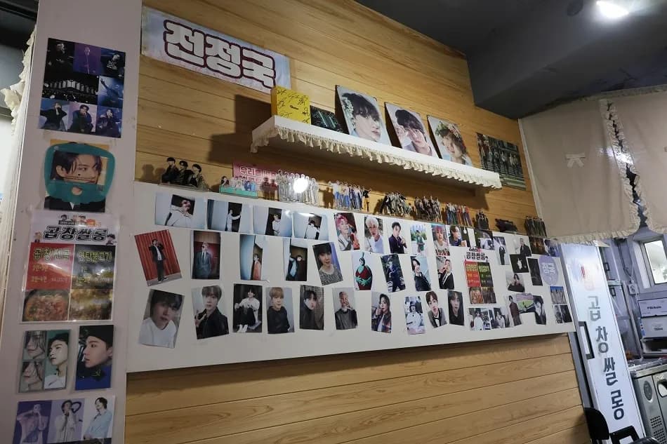 Jeon Jungkook photo and photocard wall inside Gopchang Salon Yeontangui