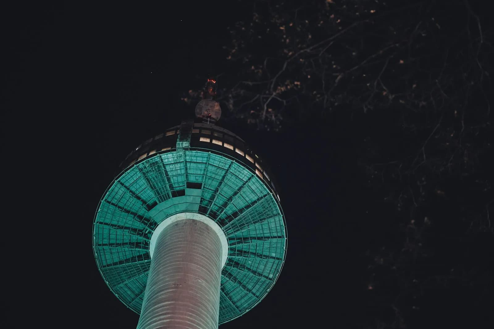 N Seoul Tower illuminated at night on Namsan mountain