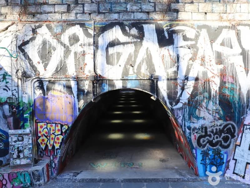 Sinchon Graffiti Tunnel entrance with colorful street art murals