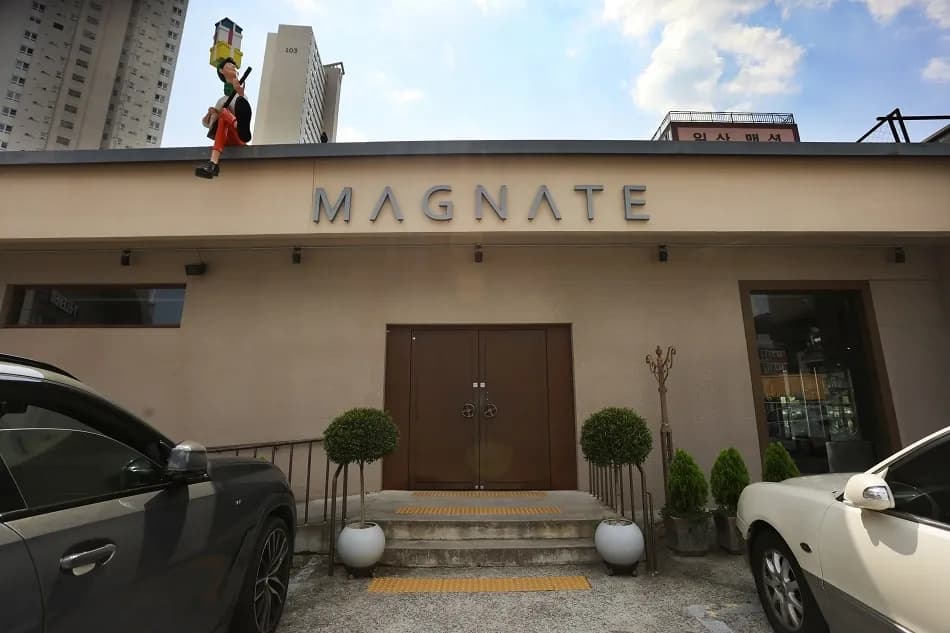 ZM-illennial cafe exterior with MAGNATE sign in Nam-gu, Busan