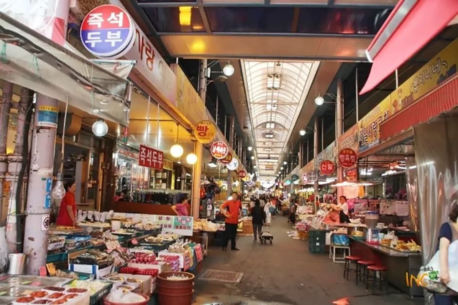 Covered arcade of stalls at Gyesan Traditional Market