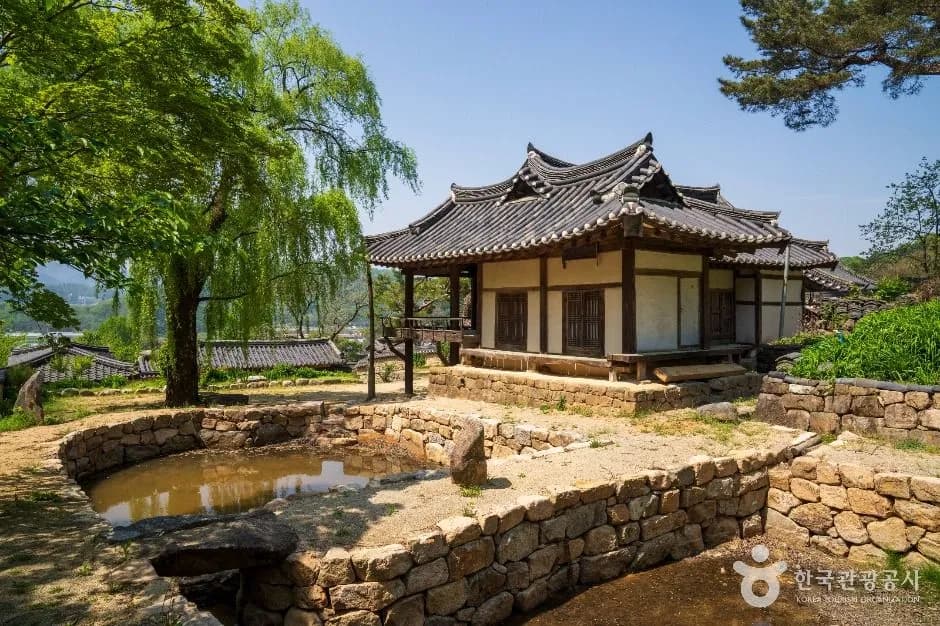 Traditional house and pond at Hangae Village