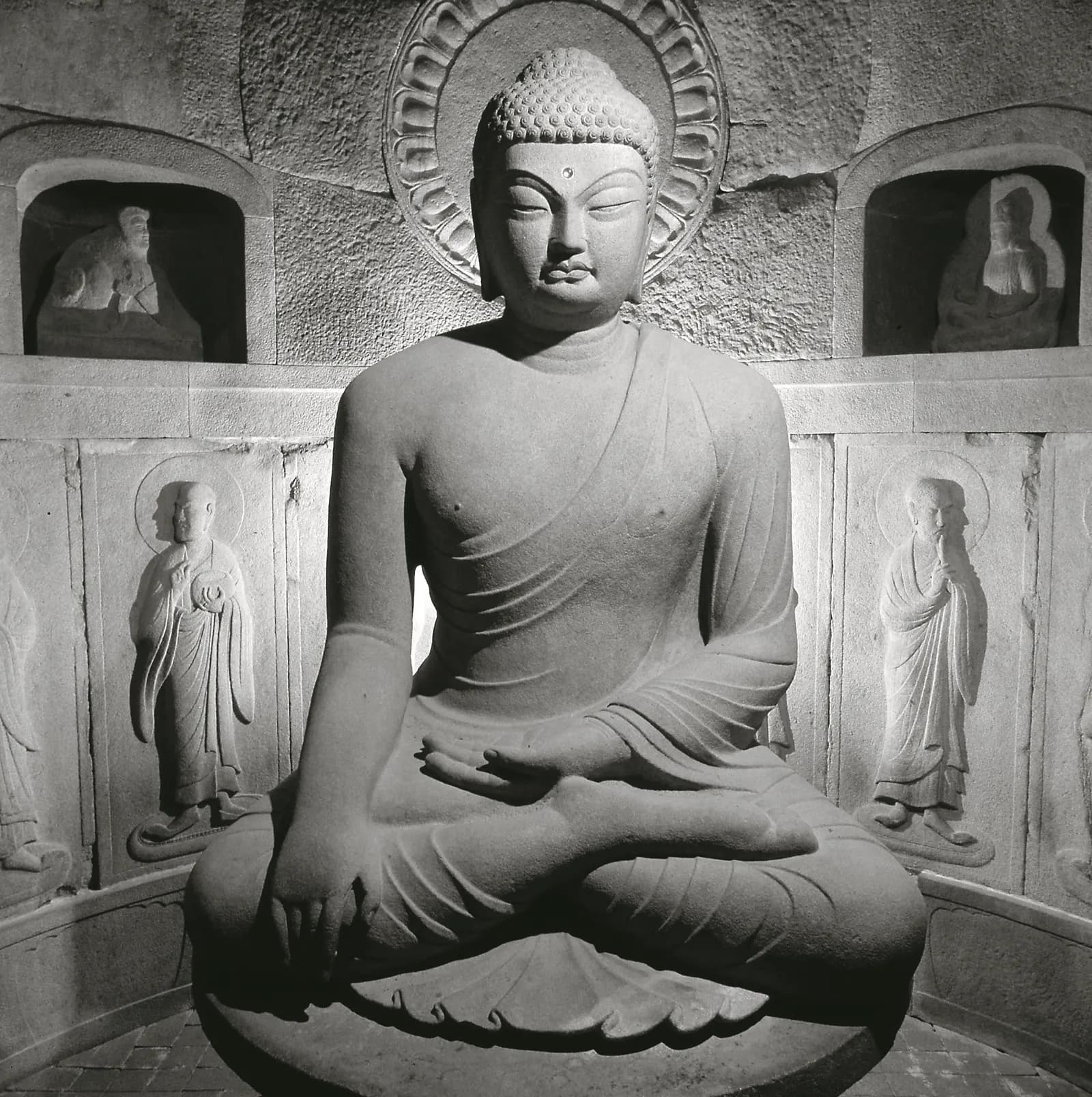The seated stone Buddha inside Seokguram Grotto, an 8th-century Silla masterpiece on Mount Toham, Gyeongju