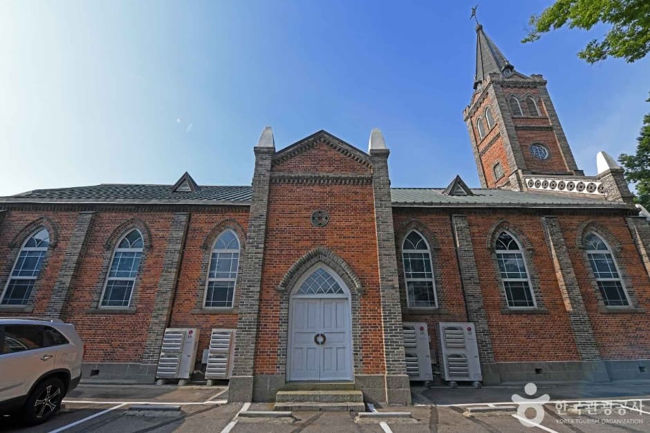 Front facade and bell tower of the Gothic-style Jungdong Catholic Church in Gongju