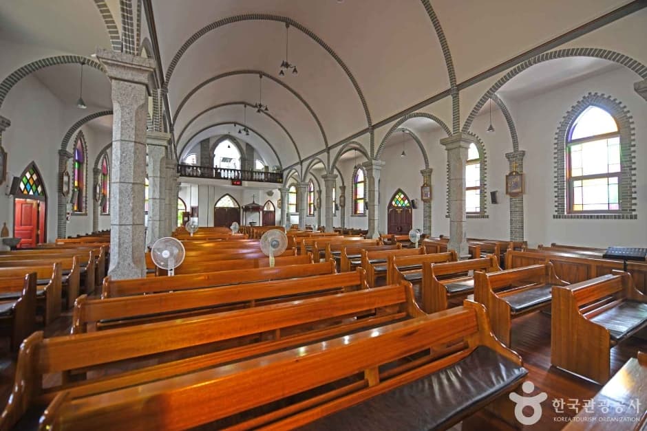 The nave and wooden pews inside Jungdong Catholic Church
