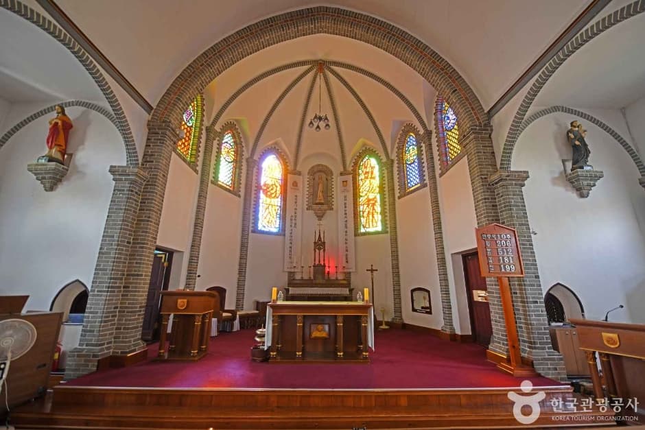 Interior altar and stained-glass windows of Jungdong Catholic Church