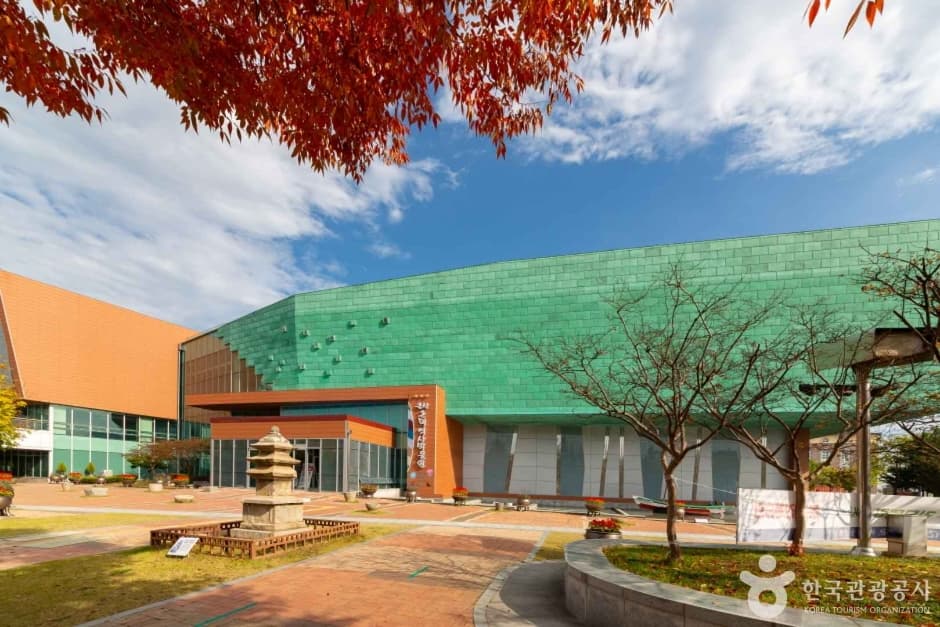The Gunsan Modern History Museum with autumn foliage at the inner port
