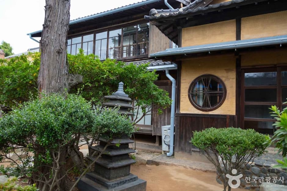 Round window and eaves detail of the Hirotsu House in Gunsan