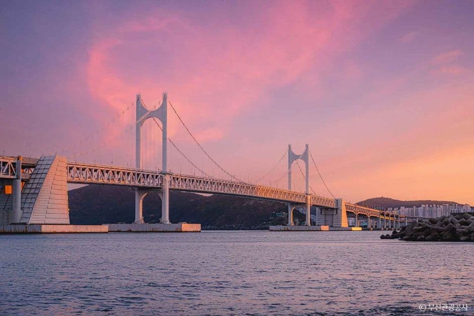 Gwangandaegyo Bridge spanning across Busan bay with city skyline