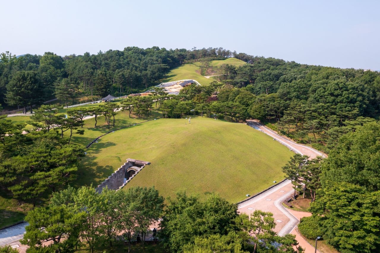 Aerial view of the grass-covered royal tomb mounds at Songsan-ri in Gongju