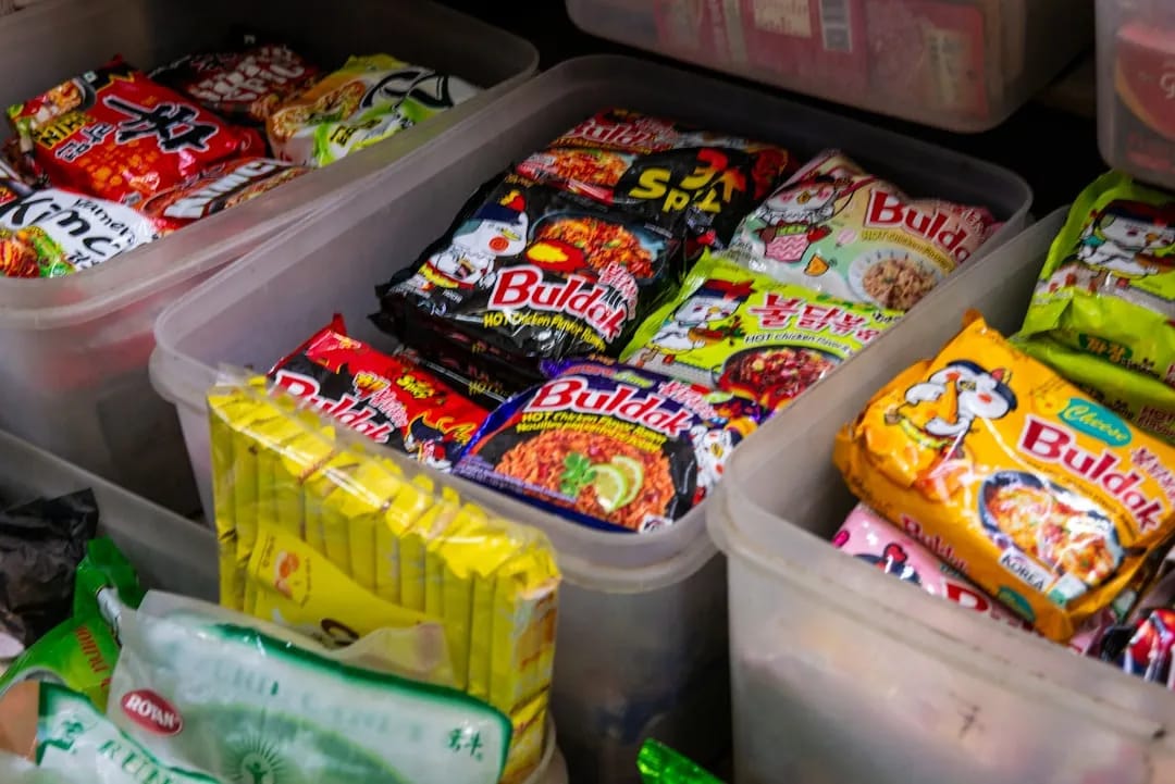 Interior of a Korean convenience store with colorful food displays