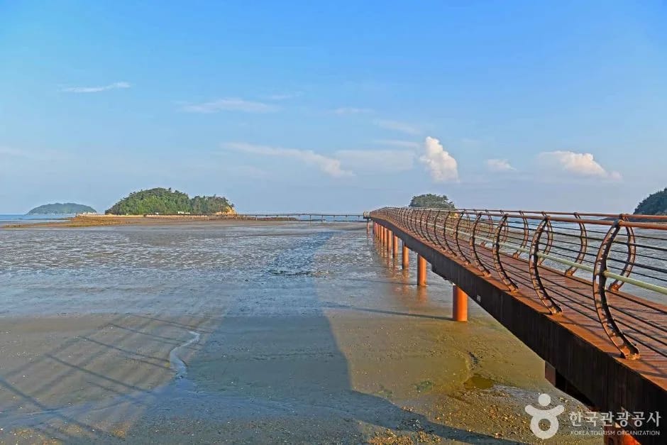 The Bridge of Infinity reaching toward a small islet off Jaeun-do, Sinan