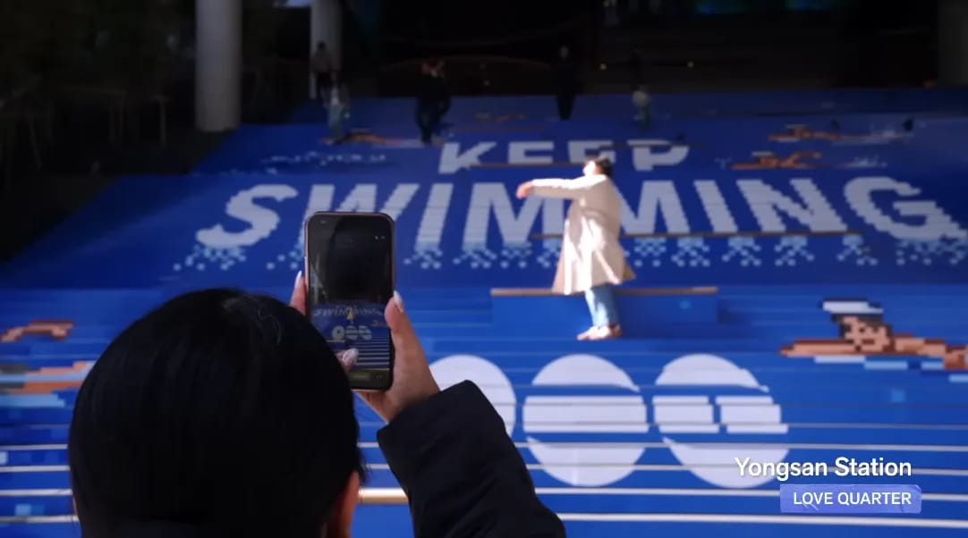 Yongsan Station glowing staircase installation during the BTS CITY ARIRANG campaign