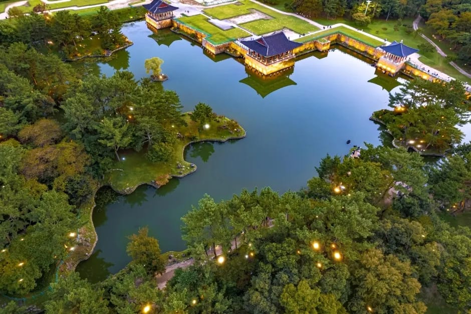 Donggung Palace and Wolji Pond at twilight, illuminated pavilions reflected in the Silla-era pond, Gyeongju