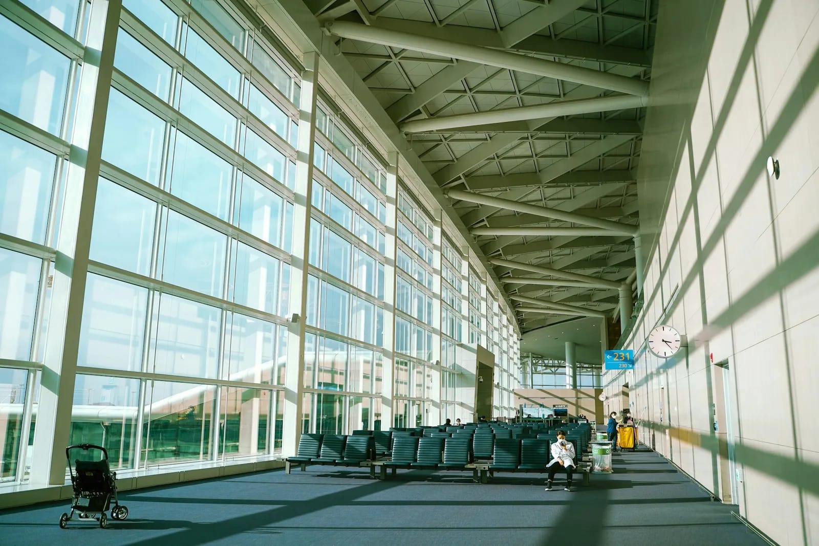 Incheon International Airport Terminal 1 departure gate with floor-to-ceiling glass windows and natural light