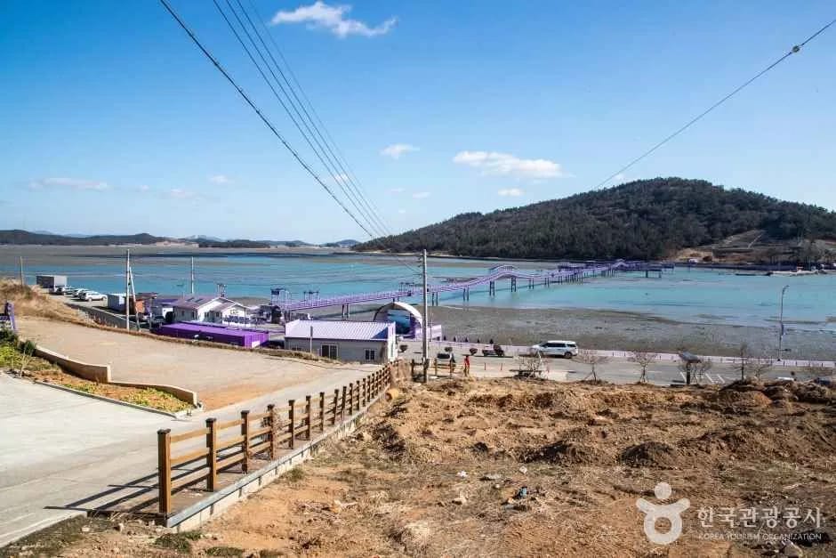Purple village and bridge of Purple Island seen from a hillside, Sinan