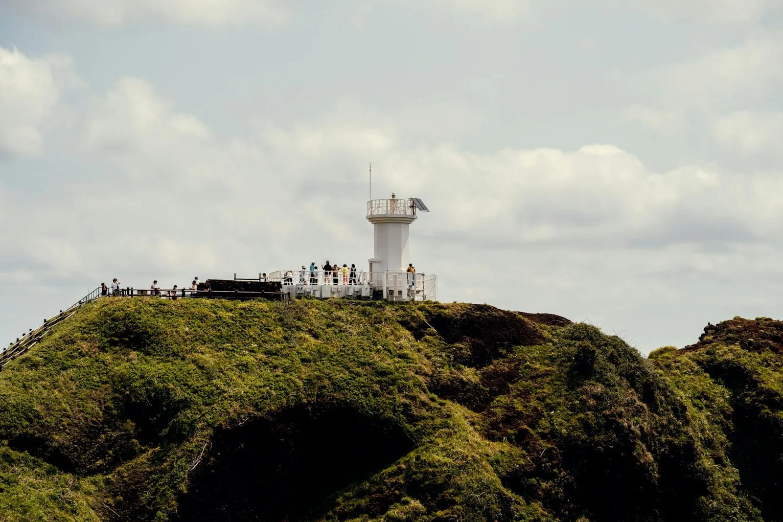 Lighthouse on the coastal walkway at Seopjikoji, Jeju Island