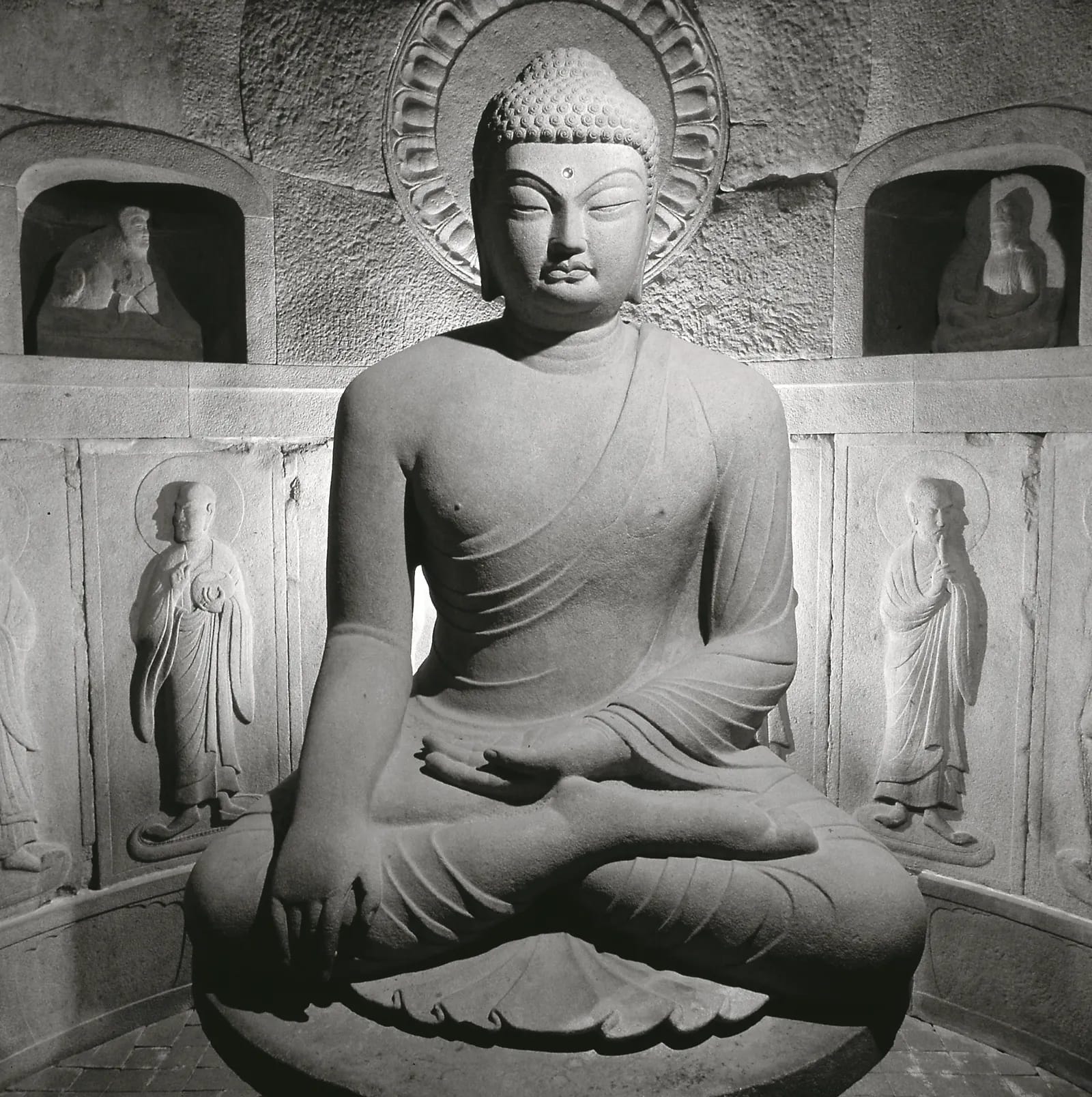 The seated stone Buddha inside Seokguram Grotto, an 8th-century Silla masterpiece on Mount Toham, Gyeongju