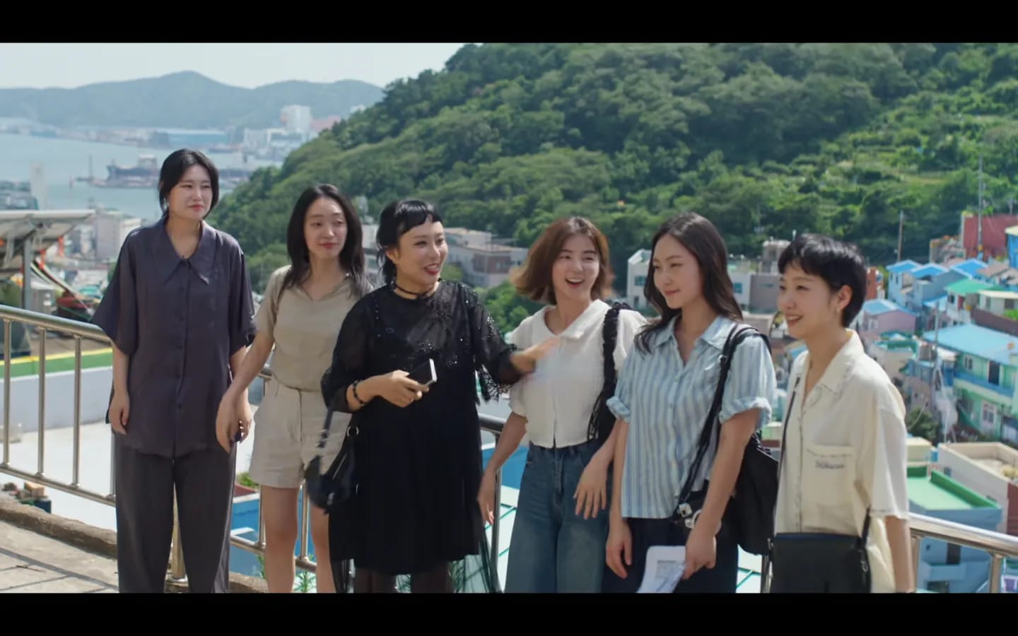 Pastel-roofed houses cascading down the Gamcheon Culture Village hillside, a key Yumi's Cells 3 Busan filming location