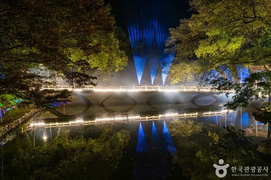 Bridge at Mujinjeong illuminated with laser and mist effects during Nakhwanori festival