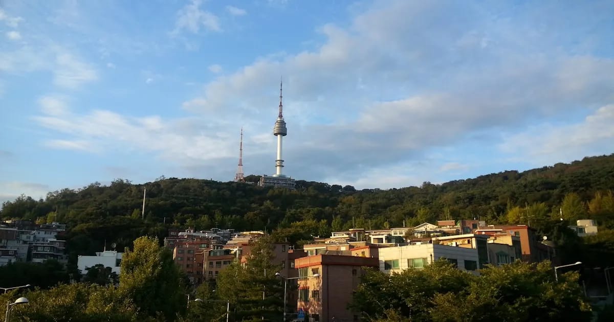 Seoul cityscape with Namsan Tower and traditional Korean rooftops