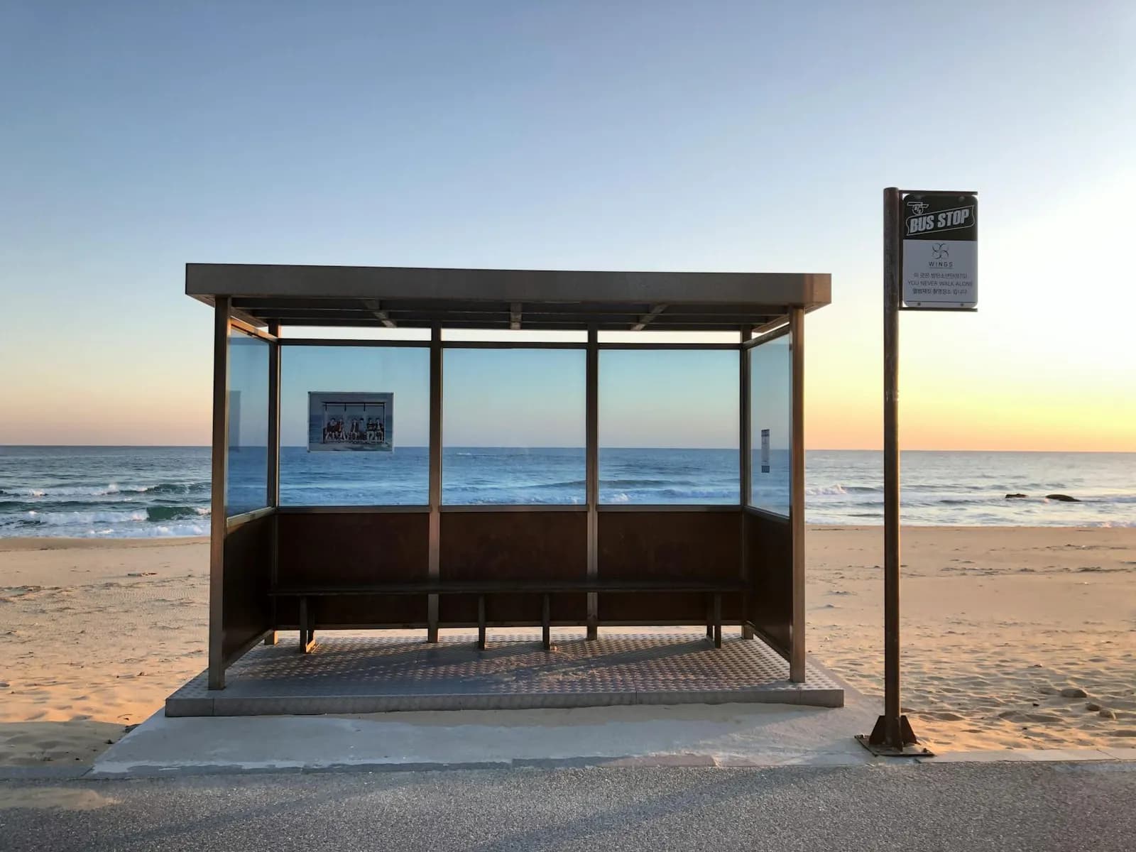 Bus stop on Jeongdongjin beach at sunrise
