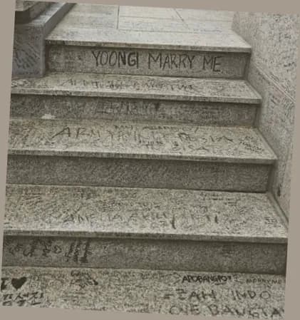 Staircase covered with fan graffiti at the old Big Hit Entertainment building in Gangnam